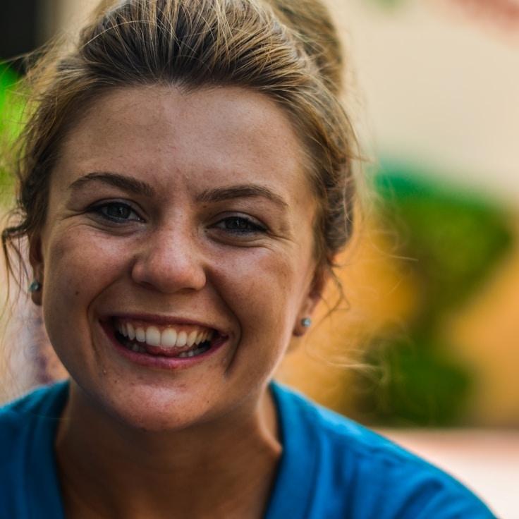 Kaveri Mehta, Lead Design Curator at Petal Hidden Field, reviewing corporate floral arrangements